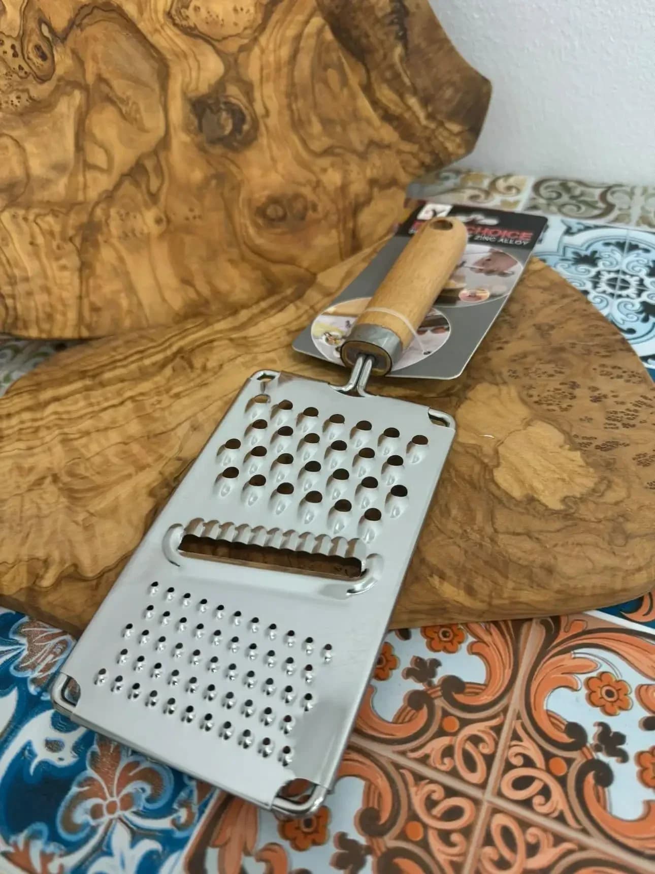 râpe en inox et bras en bois